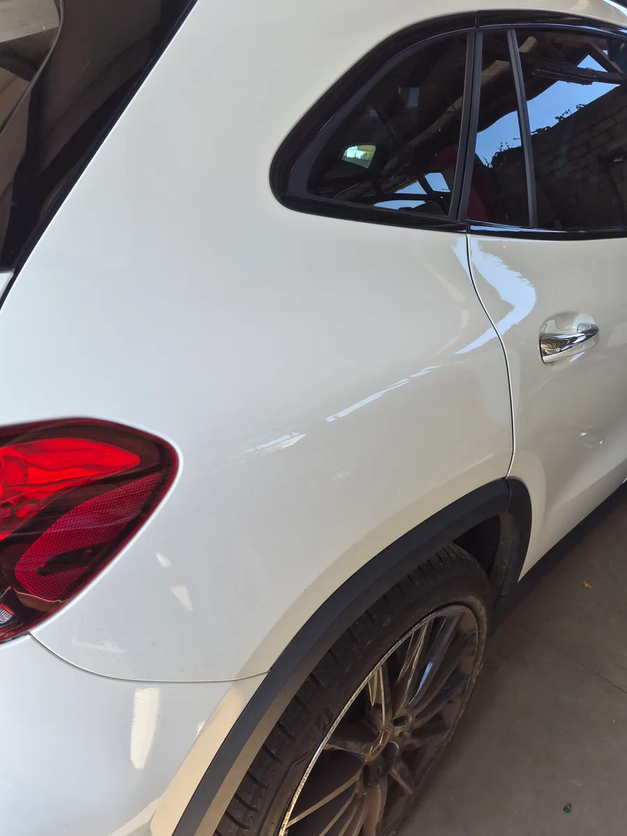 Dent on the rear quarter panel — After